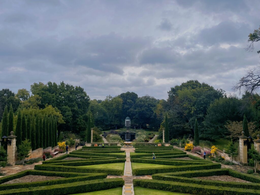 green hedges of the formal gardens at philbrook museum
