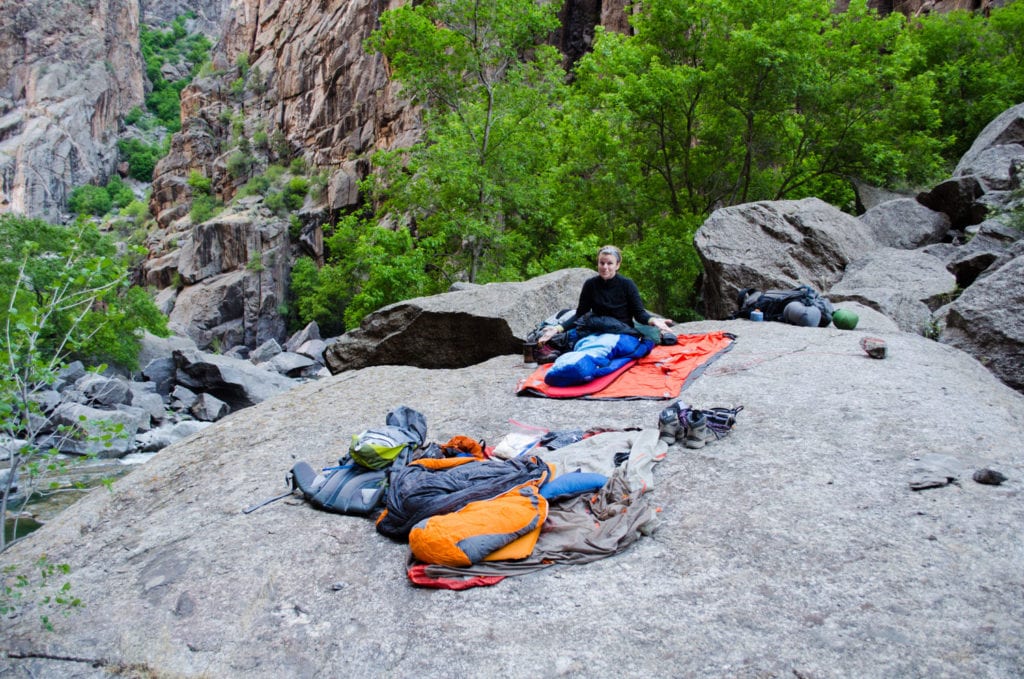 camping on a rock in the black canyon