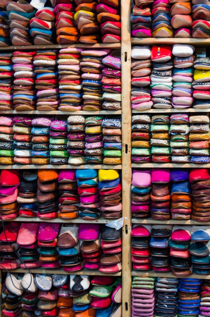 image of wall of colorful shoes Fez Morocco, editorial travel photography