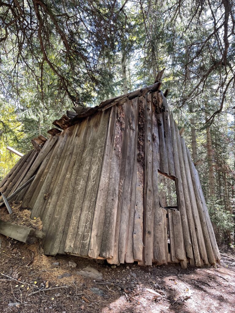 historic cabin on ice lakes trail in colorado