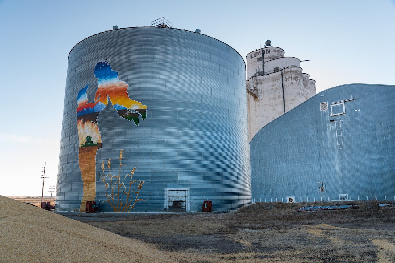 The Ultimate Travel Guide for Exploring the Colorado Eastern Plains Some Girls and a Mural artwork in Limon, Colorado