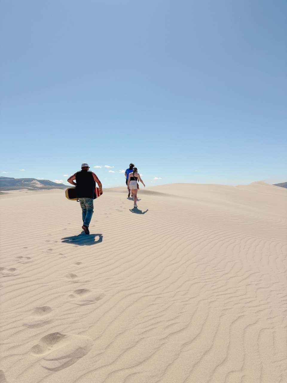 sandboarding at Killpecker Sand Dunes