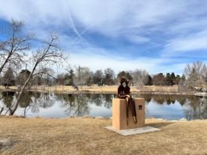 benson sculpture garden with lake in background