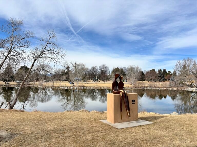 benson sculpture garden with lake in background